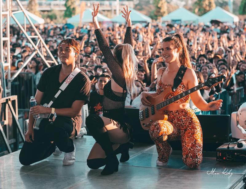 Emily Farrell with PRINS on an outside stage